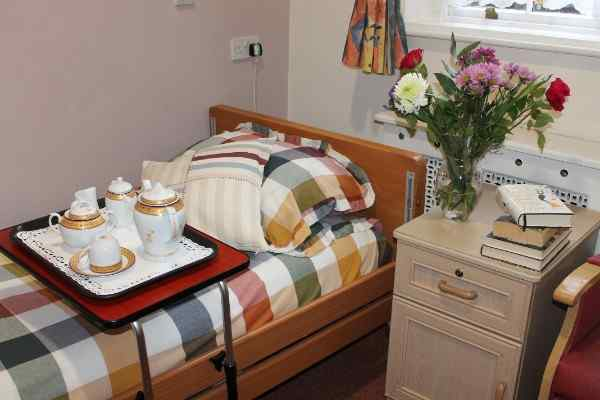 Bridge House Care Centre - A beautiful Tudor-style building with a warm, welcoming atmosphere