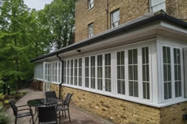 Conservatory and garden at Bridge House Care Centre